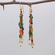 Bohemian Long Drop Earrings With Colorful Beads, Bohemian Beaded Dangle Earrings With Natural Stones, Bohemian Dangle Beaded Earrings With Natural Stones, Bohemian Chandelier Dangle Earrings With Natural Stones, Bohemian Long Drop Earrings With Dangling Beads, Vintage Dangle Beaded Earrings For Festival, Vintage Dangle Beaded Earrings, Eclectic Beaded Dangle Jewelry, Vintage Turquoise Beaded Drop Earrings