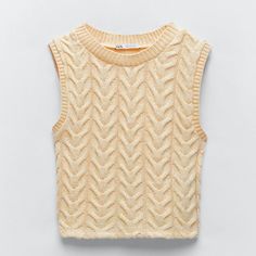 Round Neck Sleeveless Top. Soft Feel Fabric. Pastel Yellow #2 Sleeveless Textured Knit Tops For Spring, Chic Sleeveless Textured Knit Vest, Trendy Beige Tank Vest, Spring Sleeveless Textured Knit Top, Sleeveless Crochet Knit Top, Beige Textured Knit Sweater Vest For Spring, Spring Beige Textured Knit Sweater Vest, Textured Knit Tank Top For Spring, Textured Knit Tank Top