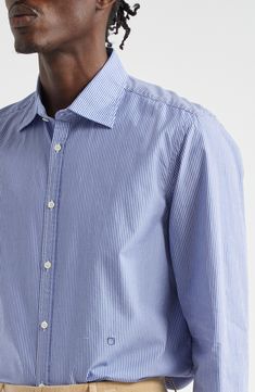 Cut from lightweight, breathable cotton, this softly relaxed button-up shirt is designed with a narrow, slightly pointed yoke in back. 31 1/2" length; 43" chest (size Medium) Front button closure Spread collar Long sleeves with button cuffs 100% cotton Dry clean or machine wash, line dry Made in Italy Designer Clothing Business Cotton Shirt With Relaxed Fit, Relaxed Fit Cotton Business Shirt, Relaxed Fit Cotton Shirt For Business, Classic Shirt With Button Closure And Straight Hem, Classic Unstructured Shirt With Shirttail Hem, Relaxed Fit Button-up Dress Shirt For Business, Collared Shirt With Back Button Closure And Relaxed Fit, Classic Shirt With Relaxed Fit And Straight Hem, Classic Summer Shirt With Straight Hem