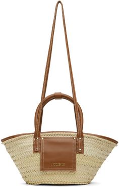 Handcrafted braided palm and leather tote in beige and brown. · Rolled carry handles · Fixed shoulder straps · Logo hardware and patch pocket at face · Lanyard-clasp fastening · Unlined · Logo-engraved gold-tone hardware · H8 x W18 x D5.5 Part of the Les Classiques collection. Supplier color: Light brown Light Brown, Patch Pocket, Leather Tote, Apparel Accessories, Patch Logo, Gold Tones, Women Wear, Tote Bag, Outfit Accessories