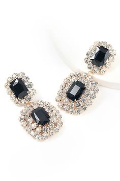 Improve your style with our Geometric Rectangle Gemstone Earrings, a chic accessory that effortlessly adds sophistication to your ensemble. Featuring intricate geometric patterns and sparkling gemstones, these earrings enhance your glamour and appeal. Whether you're attending a formal dinner, a glamorous cocktail party, or any special occasion that calls for an air of elegance, these earrings are the perfect choice. Elegant Rectangular Crystal Earrings, Rectangular Cubic Zirconia Earrings, Rectangular Earrings For Formal Occasions, Gold Rectangular Crystal Earrings For Party, Elegant Rectangular Stone Earrings, Modern Rectangular Jewelry For Party, Rectangular Crystal Jewelry For Evening, Modern Rectangular Earrings For Party, Rectangular Earrings For Evening