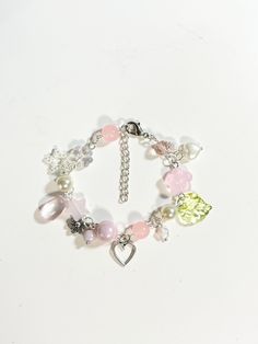 adjustable 8.5" Pink Themed Adjustable Charm Bracelet, Pink Adjustable Themed Charm Bracelet, Adjustable Pink Themed Charm Bracelet, Whimsical Silver Beaded Adjustable Bracelets, Pink Adjustable Whimsical Bracelets, Whimsical Pink Adjustable Bracelets, Pink Handmade Themed Bracelets, Handmade Adjustable Themed Charm Bracelet, Handmade Themed Adjustable Charm Bracelet