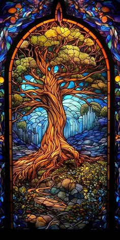 a stained glass window with a tree in it