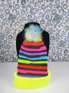 "Winter Hat, made with love for day-to-day wear in those colder months. It is sized for an adult. This winter toque has a cozy, comfortable design with a faux fur pom at the top :) Measurements: Circumference of 22-24\" inches Washing Instructions: -Machine wash warm, gentle cycle.  -Air drying is best but it can go in the dryer if needed.  (The dryer could make the yarn fuzzy over time.) -Please remove the faux fur pom while washing in order to protect it, then reattach when done. -Do not bleac Playful Hats For Cold Weather, One Size Fits Most, Playful Cold Weather Hat, One Size Fits Most, Trendy Multicolor Hats For Cold Weather, Playful Multicolor Hats For Cold Weather, Pom Pom Rainbow, Mustard Scarf, Yellow Scarf, Top Measurements, Comfortable Design