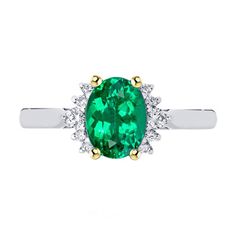 METAL SPECIFICATIONS Two Tone Gold 14K STONE SPECIFICATIONS Stone Name : Green Emerald and Diamond Stone Cut : Oval and Round Cut Stone Details : There is one oval cut green emerald stone in the center approx. 2.50 carats (Approx. Size 8.5 x 7.5 mm) with approx. 1 carat of smaller round cut diamonds on the sides. Crafted with natural earth mined stones. Color : Green/F Clarity : VS1 Quality : AAA Total : Approx. 3.50 Carats RING SPECIFICATIONS Size : 6.5 (Can ship in any size) Appraised Value : $9,738.00 Comes with Certificate Oval Green Emerald Ring With Center Stone, Classic Green Oval Rings, Elegant Green Oval Rings, Classic Green Oval Ring, Green Oval Ring With Center Stone, Green Oval Rings With Brilliant Cut, Oval Green Rings With Halo Design, Classic Oval Emerald Ring With Accent Stones, Classic Oval Green Rings