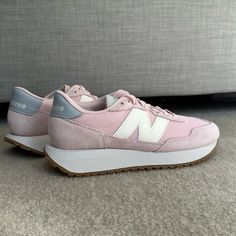 Brand New - Never Worn (No Box) Size 5 Us Color: Oyster Pink/Storm Blue Suede And Nylon Uppers Are Lightweight And Durable Eva Midsole Provides Lightweight Cushion And Support Rubber Herringbone Sole For Reliable Traction Pink Running Shoes With Round Toe And Contrast Sole, Pink Running Shoes With Contrast Sole, Casual Pink Running Shoes With Contrast Sole, New Balance Pink Sneakers With Rubber Sole, New Balance Pink Sneakers For Jogging, Pink New Balance Sneakers With Rubber Sole, Pink New Balance Sneakers For Jogging, Pink New Balance Sneakers With Branded Insole, New Balance Pink Lace-up Sneakers