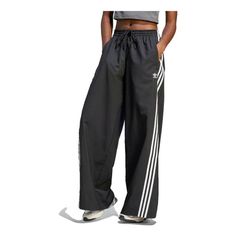 (WMNS) adidas originals Adilenium Oversized Track Pants 'Black' IV9318 Athleisure Wide Leg Sweatpants With Side Stripes, Sporty Pants For Sports In Spring, Sporty Pants For Spring Sports, Spring Sports Pants With Side Stripes, Spring Sportswear Bottoms With Side Stripes, Sportswear Sweatpants With Three Stripes For Spring, Spring Sportswear Sweatpants With Three Stripes, Adidas Sporty Wide Leg Pants, Adidas Sporty Wide-leg Pants