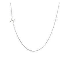 A favorite of celebrity style icons, Maya Brenner has become famous for her distinctive personalized pieces, designed at her studio in Los Angeles. This delicate necklace makes your mark with a single sans serif initial, set slightly off to the side, on a super fine cable chain in 14k gold or sterling silver.    Initial: 1/4 "; Chain: 16"  Solid 14k gold.  Sterling silver; Imported. Monogram Maker, Celebrity Style Icons, Sterling Silver Initial, Mark And Graham, Cards Sign, Custom Monogram, Make Your Mark, Delicate Necklace, Initial Necklace