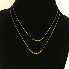 ❤️❤️❤️ On Sale 20% off and Free Shipping ❤️❤️❤️ Customized 14k gold filled bead necklace. You choose length, size and number of beads. Made to order from 14-20 inches with 3mm or 4mm beads. Beads, chain and all components are 14k gold filled - not gold plate. Gold filled jewelry is high quality and does not tarnish. These are free sliding beads and you may choose the size, as well as the number of beads. Please message me for quantities of beads not listed here. Packaged in a complimentary broca Everyday 14k Gold-filled Necklaces With Tiny Beads, Everyday 14k Gold Filled Tiny Beads Necklace, Everyday 14k Gold-filled Necklace With Tiny Beads, Everyday 14k Gold Filled Necklace With Tiny Beads, Adjustable Gold Layered Necklace With Round Beads, Yellow Gold Necklaces With Tiny Beads For Everyday, Everyday 14k Gold-filled Necklaces With Gold Beads, Minimalist Tiny Beaded Necklaces For Layering, Minimalist Gold Beads Necklace For Everyday