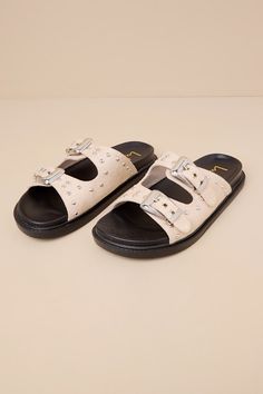 However you decide to style the Lulus Jadah Bone Suede Studded Buckle Slide Sandals, it's definitely going to be compliment-worthy! The too-cool sandals feature an almond-shaped footbed and two, wide suede straps adorned with silver studded details and adjustable Western-inspired buckles. A contoured insole completes the simple, slide-on design. Available in whole sizes only. 0. 5" rubber heel. Smooth insole. Felted rubber sole has nonskid markings. Man made materials. Imported. Lulus | Jadah Bo Suede Slides, Almond Shaped, Rubber Heels, Shoe Shop, Slide Sandals, Rubber Sole, Bones, Shoes Sandals, Almond