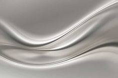 an abstract silver background with wavy lines