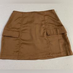 Kendall & Kylie Satin Cargo Mini Skirt. Size Small L. Brand New With Tags. Super Soft And Lightweight. Trendy And Fun! Smoke Free/Pet Free Home. Fitted Brown Skort With Pockets, Brown Mini Skort With Pockets, High Waist Brown Skort With Pockets, Fitted Mini Cargo Skirt With Lining, Fitted Lined Mini Cargo Skirt, Brown Lined Mini Skort, Brown Mini Skirt With Pockets, Fitted Brown Skirt With Pockets, Brown Mini Skort