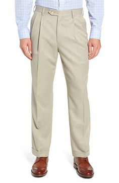 Handsome pleated pants are classically tailored in smooth microfiber that resists water and stains to keep you looking sharp. 19" leg opening; 11 3/4" front rise; 18" back rise Zip fly with button-tab closure Side slant pockets; back button-welt pockets Water- and stain-resistant 100% polyester Dry clean Imported Spring Business Casual Pants With Standard Cut Leg, Classic Relaxed Fit Dress Pants With Belt Loops, Classic Full-length Bottoms With Relaxed Fit, Classic Solid Color Long Pants, Formal Solid Bottoms With Pleated Waist, Elegant Spring Pants With Standard Cut Leg, Casual Fitted Bottoms With Pleated Waist, Solid Bottoms With Pleated Waist For Formal Occasions, Classic Tailored Bottoms With Pleated Waist