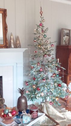 a decorated christmas tree in a living room