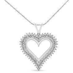 Celebrate someone you love with this stunning diamond heart pendant. This diamond necklace features 2 rows of round diamonds prong set along the edge of this open heart shape crafted of stunning .925 sterling silver, with a matching box chain necklace with a spring ring clasp. The contemporary yet classic 18" box chain complements any neckline beautifully. This authentic design is crafted of real 92.5% sterling silver that has been electro-coated with genuine rhodium (a platinum-family metal), e Luxury Open Heart Diamond Necklace For Wedding, Luxury Open Heart Brilliant Cut Diamond Necklace, Luxury Sterling Silver Open Heart Diamond Necklace, Champagne Diamond Necklace, Family Metal, Diamond Heart Pendant Necklace, Silver Diamond Necklace, Sweet Necklace, Amethyst Necklace Pendant