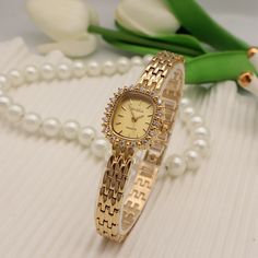 Product information: Color: gold shell gold surface, gold shell green surface, 6334 gold surface white diamond, 6334 rose gold white surface, 6334 silver white surface, 6334 gold green surface, 6346 light gold white shell E... Packing specification: 1 Applicable people: Female Style: vintage diamond Mirror material: Hardened mineral glass Watch buckle style: Jewelry buckle Buckle Material: Metal Watch strap material: metal Dial shape: diamond Case Material: Metal Packing list: Watch x1 Product Image: Elegant Formal Alloy Watches, Gold Diamond Watch With Metal Round Dial, Yellow Gold Stainless Steel Watch For Gift, Gold Stainless Steel Diamond Watch With Round Dial, Rose Gold Alloy Watch Perfect For Gift, Rose Gold Alloy Watch As Gift, Gold Stainless Steel Diamond Watch Analog, Elegant Metal Analog Watch, Gold Stainless Steel Watch As A Gift