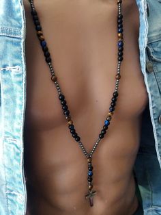 Traditional catholic rosary for men is made with shungite, tigers eye, hematite anf acrilic beads 8 mm. Gemstones give energy and power. ❋ Sizes: ❋ + Beads size: 8 mm. + Size of the pendant cross: 3x2 cm. + The length of the mens rosary: loop 74 cm (29"). You can choose any length. Send me a message. ❋ Materials: ❋ + Stones: black shungite, hematite. + Hematite cross. + Strong Italian thread. + BEAUTIFUL Gift bag. ❤️Thank you for choosing my store! Your support is important to me!❤️ Conditions o Rosary For Men, Birthday Gifts Boyfriend, Mens Rosary, Gifts Boyfriend, Goodbye Gifts, Long Distance Gifts, Catholic Rosary, Rosary Catholic, 21st Birthday Gifts