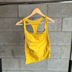 Never Worn And Super Comfortable! Summer Yellow Camisole Tank Top, Sporty Yellow Sleeveless Tank Top, Yellow Sleeveless Sporty Tank Top, Yellow Tank Top With Built-in Bra For Summer, Free People T-shirts & Tank Tops, Sublimation Ideas Projects Inspiration, Free People Tops, Free People, Tank Tops