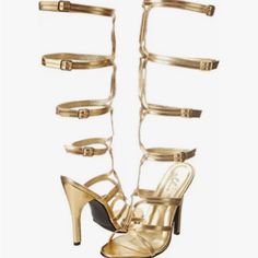 Never Worn Pair Of Gladiator Gold Sandals Adjustable Gold High Heels, Gold Adjustable Closed Toe Heels, Strapped Synthetic Party Sandals, Fitted Gold Synthetic Sandals, Strapped Sandals With Buckle Closure For Party, Party Heels With Buckle Closure And Straps, Party Heels With Buckle And Straps, Vine Heels, Gold Gladiator Heels