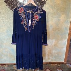 Gorgeous Navy Blue Dress Nwt Never Worn Dress Gorgeous Embroidery Front And Back S Pit To Pit 19” Length 38” Slip Is Not Included Blue Bohemian Embroidered Midi Dress, Blue Bohemian Midi Dress With Floral Embroidery, Bohemian Blue Midi Dress With Floral Embroidery, Blue Embroidered Dress For Fall, Blue Embroidered Fall Dress, Blue Long Sleeve Midi Dress With Floral Embroidery, Silk Cotton Dress, Rayon Pants, Navy Blue Dress