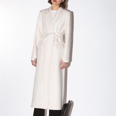 White Wool Coat Designer Tailored White Outerwear, Classic White Wool Coat For Spring, White Long Wool Coat For Work, White Long Wool Coat For Spring, Cream Wool Coat For Work, White Wool Coat For Spring Workwear, Beige Wool Coat For Spring Formal Occasions, Chic Winter White Wool Coat For Work, Chic Cream Wool Coat For Formal Occasions