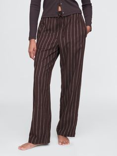 Supersoft flannel pajama pants.  Elasticized waist with drawcords.  Assorted allover prints.  Fit: Relaxed.  An easy silhouette throughout.  Models are wearing a Gap Fall Pajamas, Fall Szn, Easy Silhouette, Work Fits, Matching Pjs, Fall Pants, Flannel Pajama Pants, Flannel Pants, Pants Brown