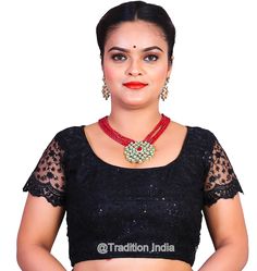 This is Black Handmade Saree Blouse. Item is made in Embroidered Net and Dupion Silk Lining Size available from 32 to 50.  All blouses have two inches margin which can be open for further adjustments   We can do any type of alteration like short sleeves or long sleeves etc Shipping - The Order will be dispatched within 2-3 working days time. Standard (Free Shipping) Orders - Will be dispatched by Postal Service. It takes about 13 to 18 working days time for most locations worldwide. The Shipping Black Zari Work Blouse For Transitional Season, Black Blouse With Zari Work For Transitional Season, Fitted Black Blouse For Transitional Season, Black Fitted Blouse For Transitional Season, Black Blouse With Pallu For Transitional Season, Black Blouse With Resham Embroidery For Festivals, Traditional Black Blouse With Resham Embroidery, Transitional Black Blouse With Pallu, Navratri Festive Black Blouse