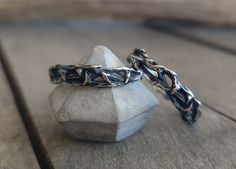 These silver thorn crown twig rings are hand carved and then casted into 925 solid sterling silver by using the ancient lost wax technique, one of the oldest techniques for making metal jewelry. The oxidized finish gives the rings a dark look that makes them more rustic and enchances the thorns around the twigs but if you would like a light finish please let me nkow and I will be happy to make it for you.  They are very comfortable to wear and smooth in the edges and have a unique character. You can choose between a: Single Thorn Ring Thorn rings Set Single Sapphire Ring (includes a thorn ring with a 2mm blue sapphire) Sapphire Ring Set (includes a thorn ring with a 2mm blue sapphire and a plain thorn ring) All our jewelry is handmade in our studio, using only traditional silversmithing te Thorn Rings, Twig Rings, Thorn Jewelry, Medieval Wedding Ring, Thorn Crown, Thorn Ring, Crown Rings, Medieval Rings, Rings Promise