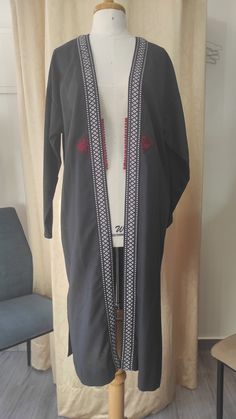 "This beautiful linen kimono IS hand finished by professional moroccan artisans. It is stylish, original,and unique.  The work of this kimono requires much Time to realize because of thé choice of Fabrice, supplies, thé matching colors, the \"aaqad\" buttons which are traditionally handmade by housewives.  It is beautifully embelished with braid and silky thread on the sides \"trassen\" and with delicate embroiedery entirely donne by hand. It is elegant and comfortable, perfect as every day Wear also for special évents. Before starting the work, the fabric is soaked in water and dried naturally in the Sun." Traditional Open Front Kaftan For Festivals, Traditional Embroidered Open Front Kimono, Traditional Long Kimono For Ceremonies, Traditional Handmade Kaftan With Kimono Sleeves, Traditional Open Front Kimono For Festivals, Linen Kimono, Womens Jackets, Matching Colors, Kimonos