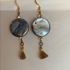 Handmade By Me, Blue And Gold Bead Earrings With A Small Gold Colored Tassel. Post Are 24 Karat Plated. Earrings Are 2 1/2 Inches Long. Bundle The Earrings With The Beautiful Blue And Gold Bead Necklace In My Collection. Blue Handmade Dangle Clip-on Earrings, Handmade Blue Round Clip-on Earrings, Blue Beaded Clip-on Earrings Gift, Gold Bead Earrings, Valentines Earrings, Gold Bead Necklace, Freshwater Pearls Earrings, Party Earrings, Circle Studs