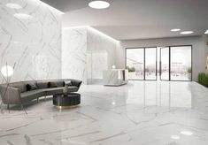 a modern living room with marble walls and flooring