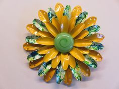 Large multi-tiered yellow, green, and green, blue and white petals with a green center with swirl. Measures 3" in diameter. Pristine condition! Woodstock here we come! White Petals, Mid Century Jewelry, Flower Jewelry, Floral Jewellery, Vintage Pins, Flower Jewellery, Woodstock, Vintage Flowers, Flower Power