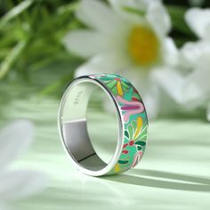 Add a serious dose of radiance to your outfit with splash of color! Bright and whimsical, the silver enamel band ring makes a statement with any outfit. Combine this trendy piece with other enamel pieces to vibrant and radiant effect. Enjoy the benefits of it, such as brining good luck and love, enhancing health and beauty.Weight: 5.84 gWidth: 7.2 mmHeight: 1.7 mmThickness: 1.6 mmMaterial: 925 SilverPlating Color: Silver Enamel Jewelry For Spring Gifts, Spring Enamel Jewelry For Gifts, Spring Enamel Jewelry As Gift, Spring Gift Enamel Jewelry, Spring Multicolor Hand-painted Jewelry, Spring Hand Painted Jewelry, Hand Painted Jewelry For Spring, Hand Painted Jewelry As Spring Gift, Hand Painted Jewelry For Spring Gift