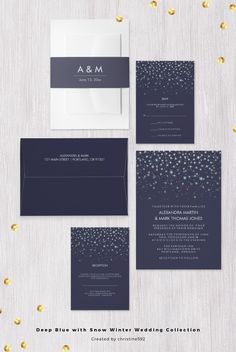 the wedding stationery is shown with gold confetti on it and blue paper