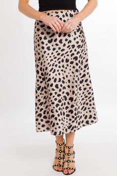 Chic Flowy Leopard Print Skirt, Chic Leopard Print Skirt, Chic Leopard Print Lined Skirt, Chic Lined Leopard Print Skirt, Chic Leopard Print Skirt For Spring, Leopard Print Relaxed Midi Skirt, Leopard Print Relaxed Fit Midi Skirt, Chic Leopard Print Midi Skirt, Spring Leopard Print Midi Skirt