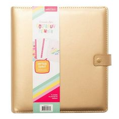 a tan leather folder with a notepad attached to the front and side of it