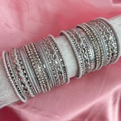 2 stacks of silver bangle sets with pearly end bangles. Ready to ship 📦 White Stackable Bracelets For Party, White Stackable Bangle, Silver Stackable Bangle For Festive Occasions, The Bangles, Wedding Jewelry Earrings, Silver Bangle, Bangle Set, Silver Bangles, Silver Pearls