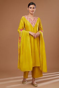 Mustard yellow kurta with gota patti embroidered neckline. Paired with a palazzo and dupatta. - Aza Fashions Festive Yellow Palazzo Set With Mirror Work, Yellow Chanderi Kurta With Mirror Work, Yellow Traditional Wear Straight Kurta With Mirror Work, Yellow Traditional Wear With Mirror Work Straight Kurta, Yellow Kurta With Mirror Work For Navratri, Yellow Palazzo Set With Mirror Work And Traditional Drape, Yellow Mirror Work Kurta For Diwali, Yellow Traditional Drape Palazzo Set With Mirror Work, Elegant Yellow Kurta With Mirror Work