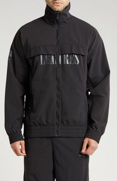 This relaxed-fit track jacket is part of a collab with PLEASURES and is inspired by a clash of racing and punk-inspired streetwear. Bold tonal branding for both labels subtly reflects against the sleek nylon on the outerwear, while underarm ventilation keeps it breathable throughout the day. 28" length (size Medium) Front zip closure Stand collar Elastic cuffs and hem Side zip pockets Underarm ventilation Water-repellent 100% recycled nylon Machine wash, tumble dry Imported PUMA has received the Sporty Outerwear With Graphic Print For Sports, Sporty Windbreaker With Graphic Print For Streetwear, Casual Black Track Jacket With Graphic Print, Techwear Windbreaker With Reflective Details For Streetwear, Functional Windbreaker With Ribbed Cuffs For Streetwear, Sporty Letter Print Track Jacket For Streetwear, Black Techwear Track Jacket With Reflective Details, Urban Outerwear With Logo Print For Streetwear, Sporty Black Outerwear With Graphic Print