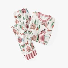 Your gingerbread family will enjoy the sweetest dreams of the season in our matching PJs. The festive design is printed on organic cotton for the ultimate softness and finished with a collar and cuffs in candy-cane stripes. DETAILS THAT MATTER One-piece nursery pajamas, kid's and adult tight fit pajamas all features ribbed collar and cuffs on the sleeves and ankles. Pants have an elastic waistband. One-piece Nursery Pajamas features snap button closure which runs along inseam; adult flannel paja Santa Sessions, Gingerbread Family, Santa Pajamas, Sweetest Dreams, Coaster Crafts, Matching Pjs, Adult Pajamas, Candy Cane Stripes, Baby Christmas Outfit