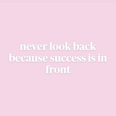 a pink background with the words never look back because success is in front on it