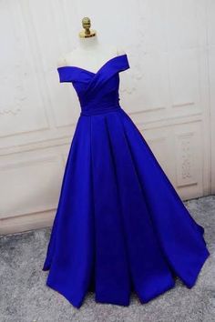 Off-shoulder Ball Gown For Gala During Prom Season, Off-shoulder Ball Gown For Gala And Prom Season, Elegant Off-shoulder Ball Gown For Formal Events, Elegant Royal Blue Ball Gown For Party, Blue Off-shoulder Gown For Prom, Elegant Blue Strapless Ball Gown, Blue Strapless Ball Gown For Evening, Fitted Royal Blue Ball Gown For Evening, Elegant Blue Off-shoulder Dress For Evening