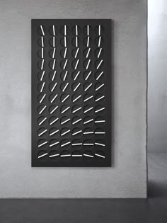 a black and white photo of an abstract art piece