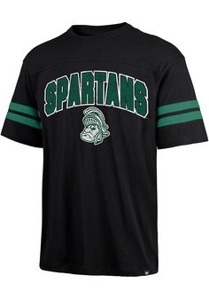 Support your Michigan State Spartans in this Black Short Sleeve Fashion Tee! This Donovan Berkeley Fashion T Shirt features a screen print team graphic across chest. Be ready to shout "Go Spartans" when you wear this MSU Short Sleeve Fashion T Shirt in the stadium or on the street. Vintage feel, Ring-spun combed cotton, Distressed graphic, Self fabric team applique on front chest and left sleeve, Tagless, 100% COTTON Black Cotton T-shirt With Team Logo, Collegiate Black T-shirt For Sports Season, Collegiate Black T-shirt With Team Name, Black Collegiate T-shirt For Sports Events, Black College T-shirt With Team Logo, Black T-shirt With Team Logo, Black Cotton Sports Fan T-shirt, Black Collegiate Jersey T-shirt, Collegiate Black Jersey Top