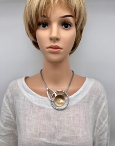 "Lovely geometric statement necklace, three tone bold necklace Fun short stylish necklace with a stainless steel chain Necklace: 19 1/4\" long or 49.5cm Plus an extender chain Pendant height: 2 3/4\" or 70mm Pendant width: 2 3/4\" or 70mm Weight: 1.4oz  , or 40g Different chain length available upon request. Please add to notes on purchase  Please note that all measurements are approximate and colours may vary due to lighting.   Please check dimensions and weights to make sure for proper fit and comfort Check out my Etsy shop for more  Designz at: https://www.etsy.com/ca/shop/DistinctiveDesignzCA?ref=search_shop_redirect" Modern Metal Necklace With Snake Chain, Modern Metal Snake Chain Necklace, Modern Metal Snake Chain Necklace As Gift, Modern Metal Snake Chain Necklace Gift, Stainless Steel Chain Necklace, Bold Necklace, Stylish Necklace, Childrens Crafts, Chain Pendant