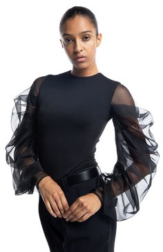 Preorder If Your Size Is Not Available. We'll Ship Within 7-10 Days. Styling: Tolemee is an elegant draped sleeve top. The fitted body is lined in the self-fabric for extra cover and comfort. The oversized sheer silk sleeves ensure you will steal all the attention every time you wear it. This is a versatile piece you can wear with skirts or pants. A true wardrobe staple you will enjoy for years to come. It looks great here worn over our Endless pants. Fit: The top is fitted, true to size, and th Elegant Stretch Mesh Top For Party, Elegant Party Mesh Top With Stretch, Evening Tops With Gathered Balloon Sleeves, Spring Evening Top With Elastic Sleeves, Elegant Summer Mesh Top With Mesh Sleeves, Elegant Mesh Top With Mesh Sleeves For Summer, Spring Evening Tops With Elastic Sleeves, Evening Tops With Elastic Sleeves For Spring, Evening Mesh Top With Sheer Sleeves