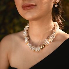 This freshwater keshi pearl necklace is meticulously crafted from exceptionally unique and unusually shaped natural keshi pearls, ranging in size from 14mm to 22mm, each of which is drilled through the center.  The centerpiece of this statement necklace is a 14k gold-plated large baroque pearl, complemented by a delightful assortment of stacked Keshi pearls. These Chinese keshi pearls have a lovely beige tone and feature various colors, primarily white, among them. Hopefully, you will love this Unique White Baroque Pearl Jewelry, Baroque Pearl Necklace With Natural Stones As Gift, Single Strand Mother Of Pearl Necklace Gift, Single Strand Mother Of Pearl Necklace For Gift, Keshi Pearl Necklace, Necklace Ideas, Unique Birthday Gifts, Keshi Pearls, Pearl Choker