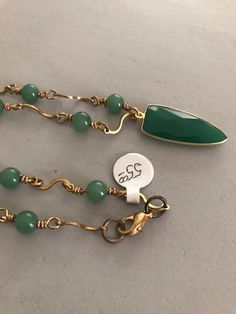 Unusual green onyx faceted drop on a gold filled chain with green jade beads. This unique and fashionable pendant is a one of a kind creation. Kill Devil Hills Nc, Sterling Silver Locket, Onyx Pendant, Silver Lockets, Pendant Gold, Jade Beads, Green Onyx, Green Jade, Jade Green