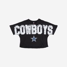 Make sure your fan fashion is nothing short of top of the line. Or should we say "crop top of the line"? Because no one's going to look better than you when you put on this Dallas Cowboys Womens Petite Distressed Wordmark Crop Top. Features Printed team logo on display so everyone knows who you're rooting for on gameday Team colored, printed team name display for additional team spirit Crop top design so you can look fashionable AND fan-tastic Short sleeves to keep you feeling and looking cool D Dallas Cowboys Outfits Woman, Nfl Wives, Dallas Cowboys Outfits, Crop Top Design, Dallas Cowboys Women, Dallas Cowboys Shirts, Crop Top Designs, Fan Fashion, Cowboy Outfits