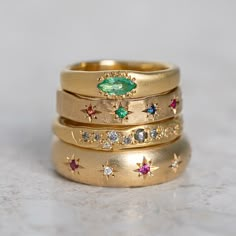 Our Wonky Stackable is set with a marquise emerald. Emerald measures 5 x 3mm. Band width 4.6mm tapering to 2.2mm at back approx. Metal weight 3.6g approx. Pictured in the first image with a matte finish. For a high shine finish please leave a note at checkout.